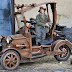 Carpenter shapes wooden motor tricycle