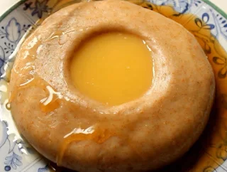 In Southern South Sudan, Aseeda is a giant doughy dumpling dish made with three simple ingredients; flour, water, and salt topped with melted butter and honey.