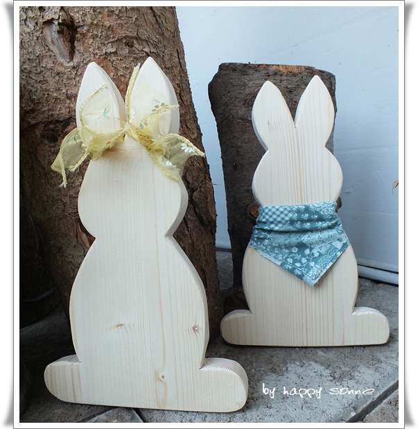 Happy Sonne: Osterhasen aus Ton und Abfallholz....