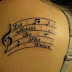 Let music be the voice ink tattoo on back body