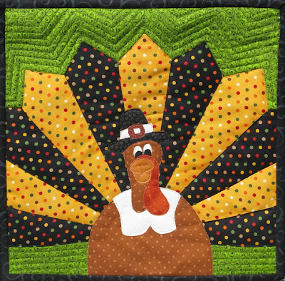"Turkey Trivet Tuxedo" is a Free Thanksgiving Quilted Table Pattern designed by Joan Kawano from Moosestash Quilting!