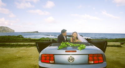 wedding in Hawaii bride and groom sits in the car