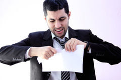 angry business man image arab wearing black suit feeling work cutting paper 66582947 أسباب و علاج العصبية و الغضب في رمضان.