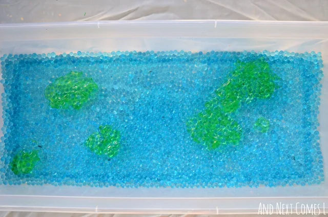Earth sensory bin with water beads and aloe vera gel