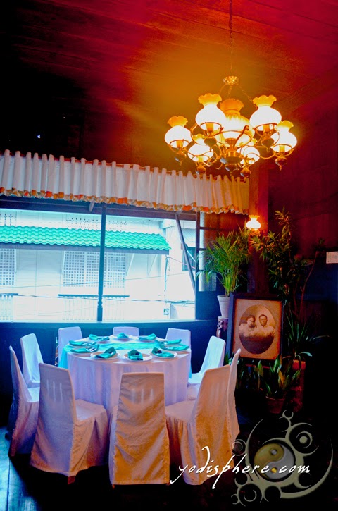 hover_share Old ambiance of the dining area of the Casa de Don Emilio restaurant in Boac Marinduque