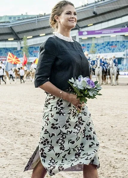 Princess Madeleine wears Alberta Ferretti Pleated Neck Wool Blend Jacket and Baum Und Pfergarten Sashenka Floral Midi Skirt
