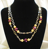 Gold chain and purple crystal