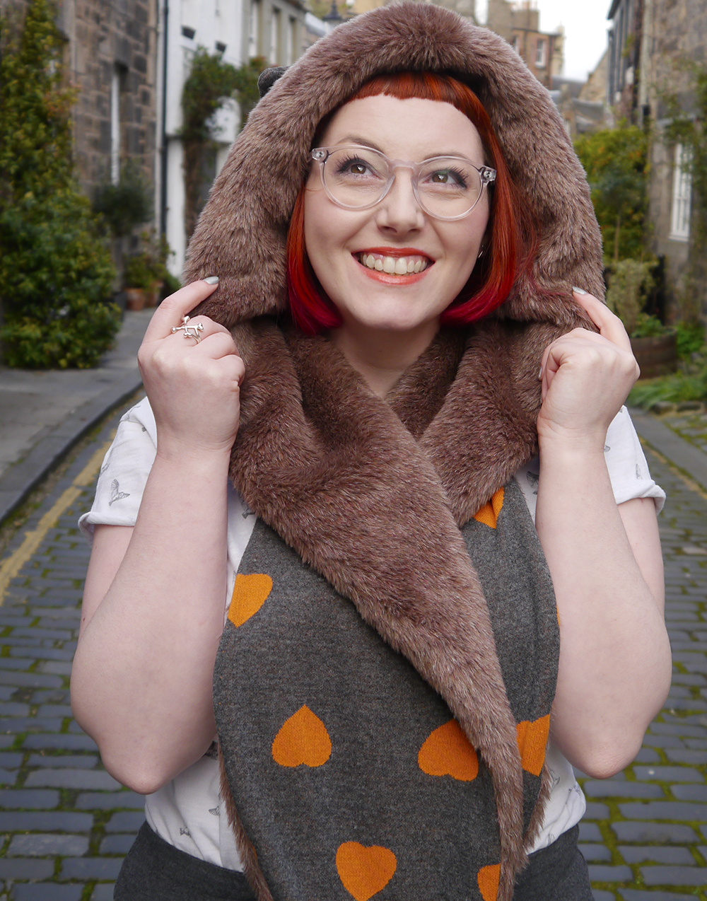Hollyhood Kitty Heart Styled by Helen, Scottish blogger, Scottish fashion blogger, red head, Chouchou, Chouchou Couture, fashion hood, hood scarf, kitty hood, kitty ears, faux fur, love heart print, pops of orange, bonnie bling, ginger, giner necklace, casual day look, casual everyday style, Edinburgh, Stockbridge Edinburgh, Edinburgh blogger, independent designer, #HOODGIRL