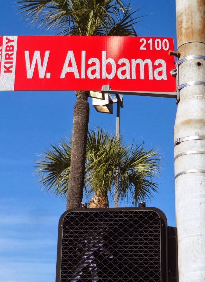 Photo of red and white UPPER KIRBY street name sign: 2100 W. Alabama Photo of red and white UPPER KIRBY street name sign: 2100 W. Alabama