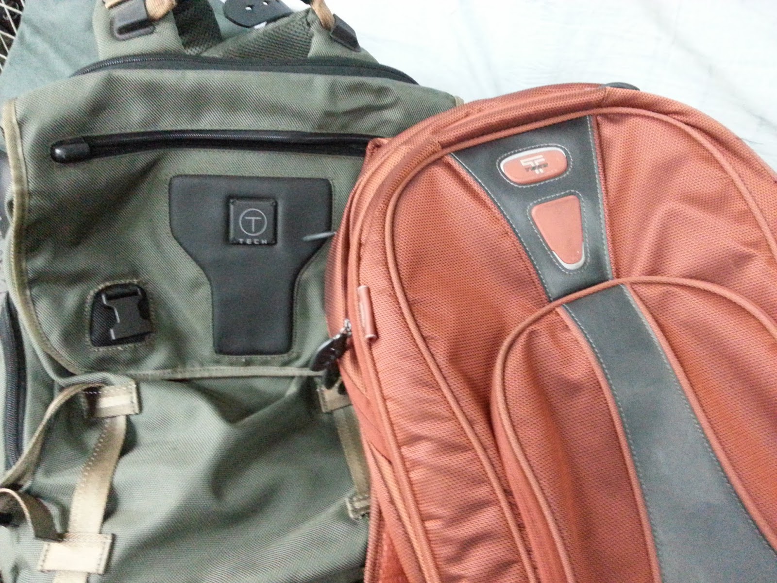 Tumi Bag Repair, tumi luggage wheel replacement, zipper repair, bag