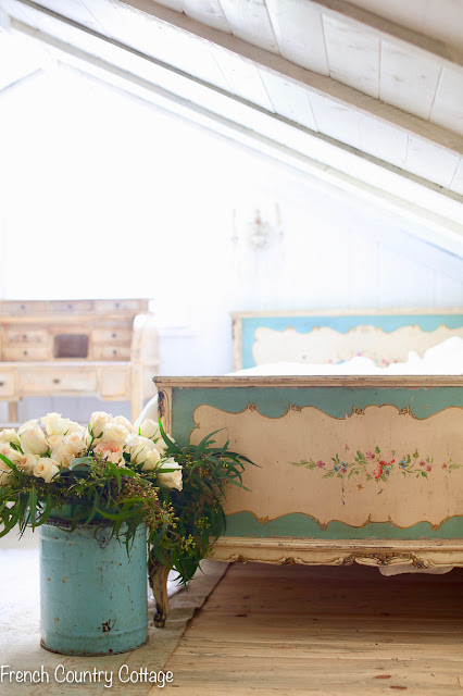 Vintage floral painted beds in the attic