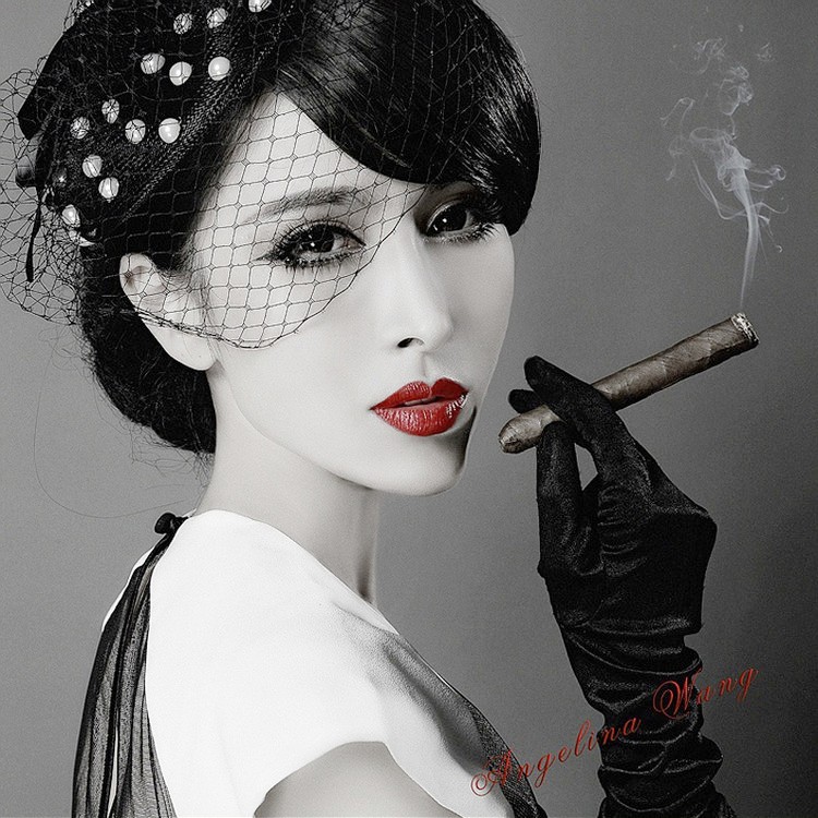 Asian women smoking cigar