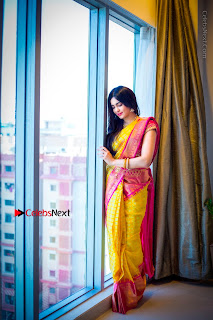 Actress Adah Sharma Exclusive Poshoot in Beautiful Yellow Silk Saree at Saree Niketan Showroom Launch  0005