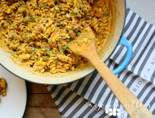 This creamy, gluten free taco pasta is cooked in one pot and comes together in under 20 minutes, giving you your evenings back!