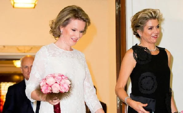 Queen Mathilde and Queen Maxima attend the finals of the Queen Elisabeth piano competition in Palace of Fine Arts. Queen Mathilde and Queen Maxima wore Natan Dress