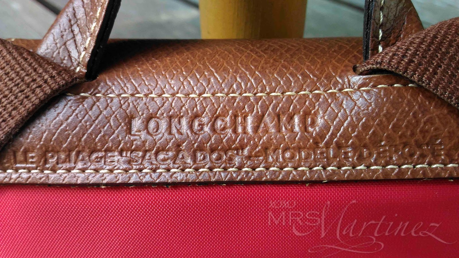 how to identify original longchamp bag