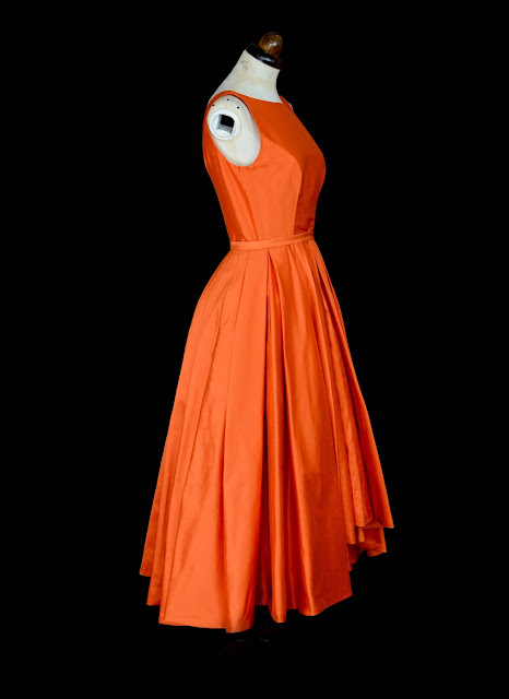 Orange silk dress by Alexandra King