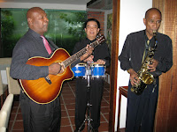 The band strolling along during cocktail
