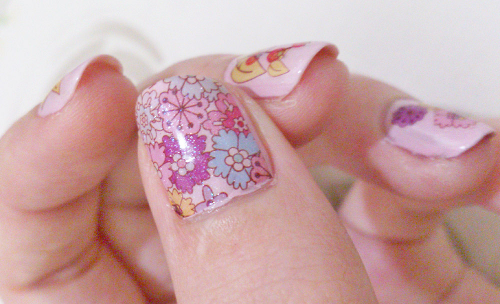 4. Floral and Feminine Nail Art for Girls - wide 8