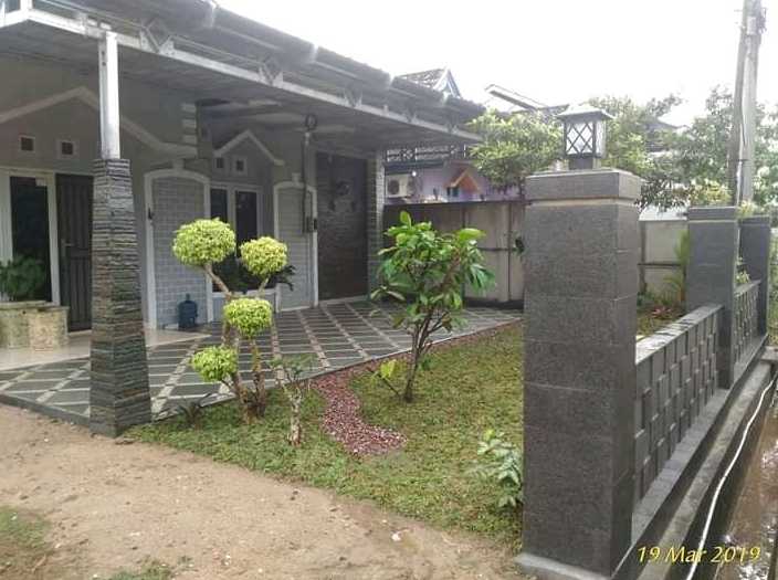 Desain Tampak depan teras rumah minimalis batu alam