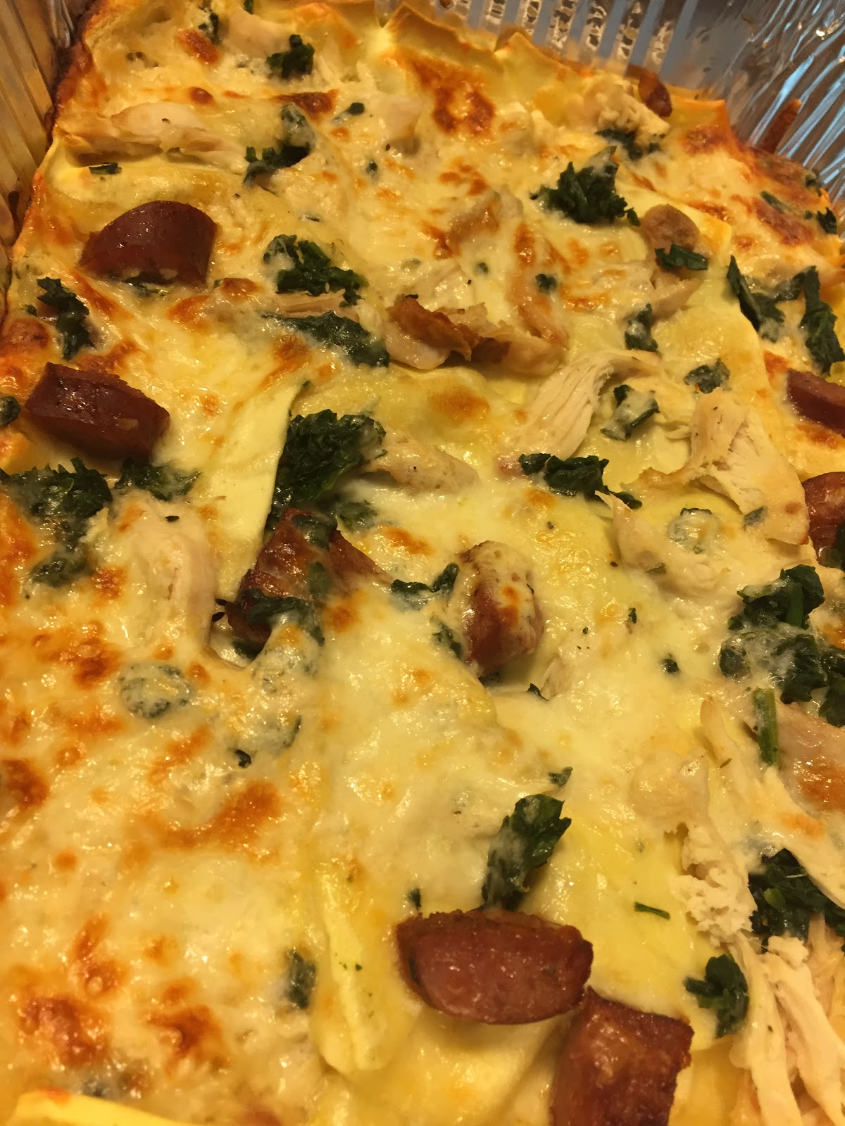 Ain't no cooking like Momma's Chicken Spinach Smoked Sausage Alfredo