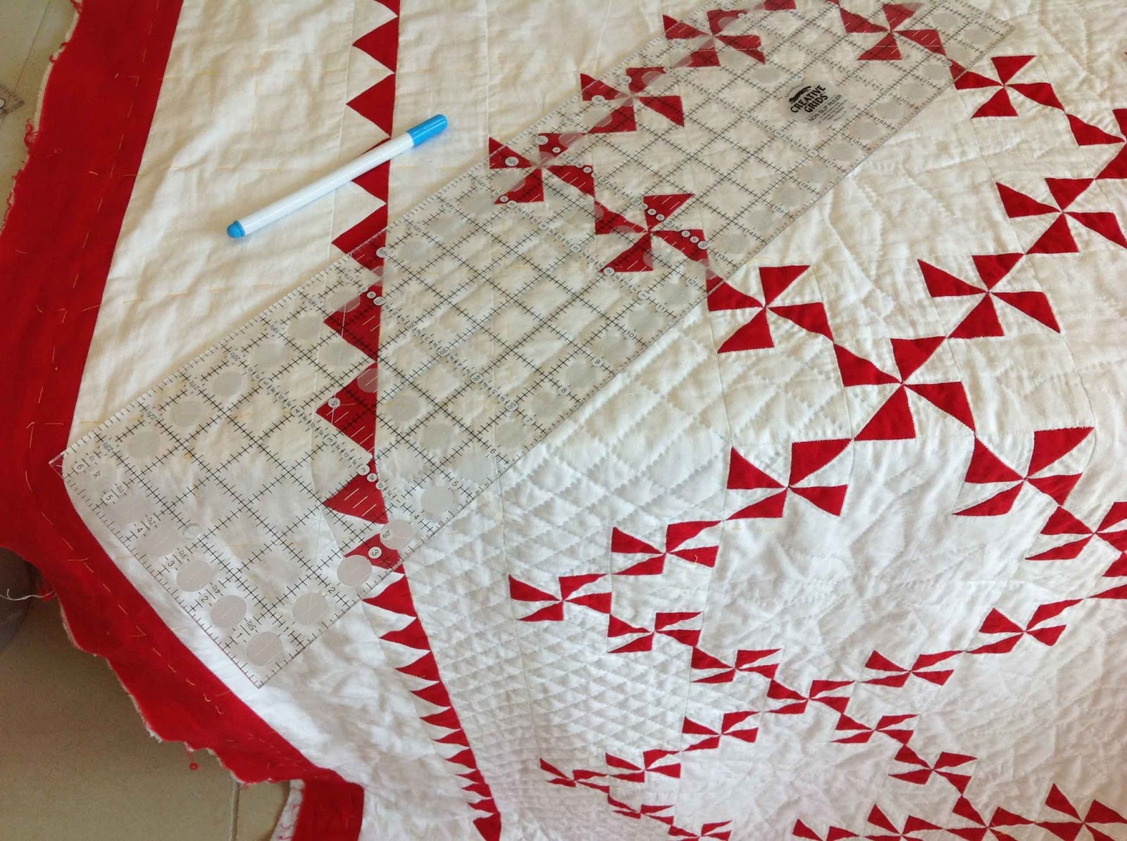 Fabadashery Hand Quilting Progress Red and White Pinwheel Quilt