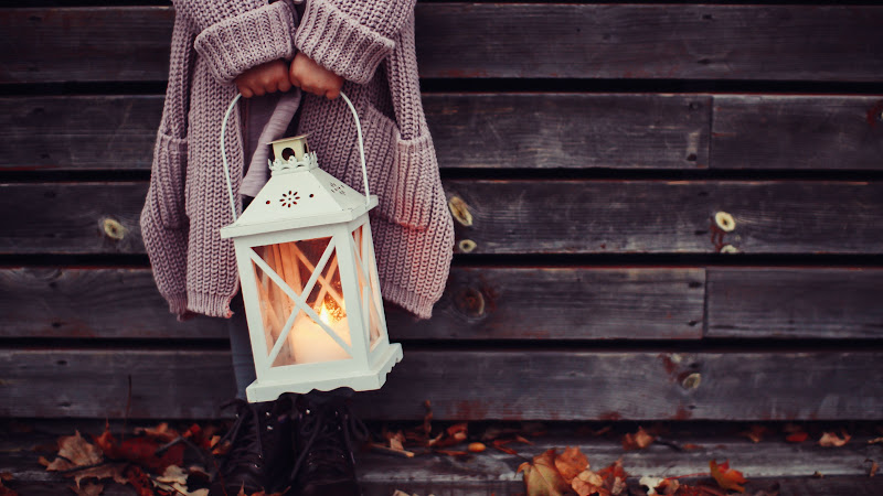 Autumn Leaves and a Child with a Lantern