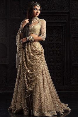 Golden color half sleeves Indian wedding outfit.