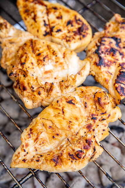 Buttermilk Hot Sauce Brined Chicken - seriously the most tender and juicy chicken we've ever made!!! Chicken marinaded overnight in buttermilk, water, salt, pepper, garlic, lime, brown sugar and hot sauce. Brush the chicken with some BBQ sauce before taking off the grill. We LOVED this chicken! We always double the recipe and never have leftovers! YUM! #chicken #grill #grilledchicken #marinade Buttermilk Hot Sauce Brined Chicken - seriously the most tender and juicy chicken we've ever made!!! Chicken marinaded overnight in buttermilk, water, salt, pepper, garlic, lime, brown sugar and hot sauce. Brush the chicken with some BBQ sauce before taking off the grill. We LOVED this chicken! We always double the recipe and never have leftovers! YUM! #chicken #grill #grilledchicken #marinade