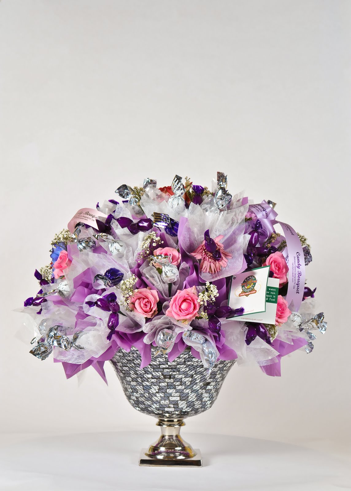 Candy Bouquet Soon In Doha Combination between chocolate & Flowers