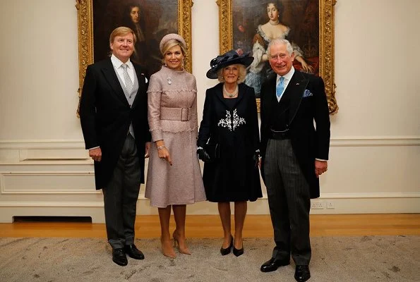 Queen Elizabeth II, Prince Charles and Camilla, Duchess of Cornwall. state banquet at Buckingham Palace. Maxima wore a new jacket by Claes Iversen