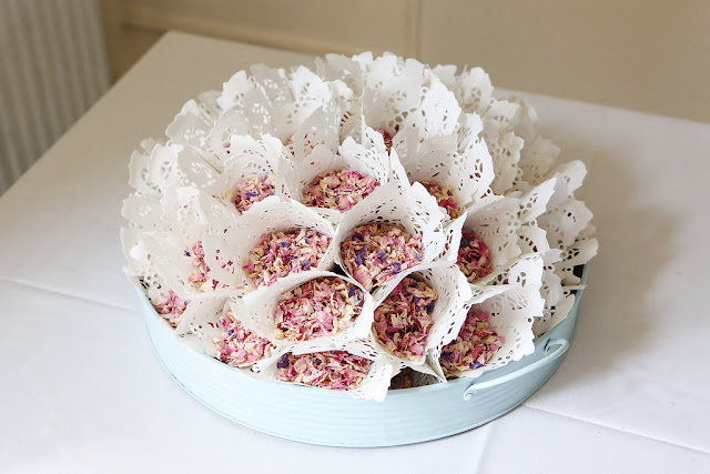 Looking to make your own DIY confetti cones? Here is a great tutorial for cute, cheap and easy doily confetti cones!