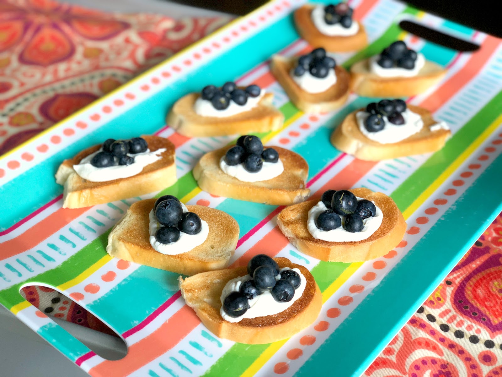Goat Cheese, Prosccuito and Blueberry Crostini