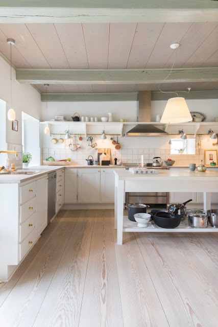 Breathtaking European farmhouse kitchen with exquisite wood floors by Dinesen on Hello Lovely Studio