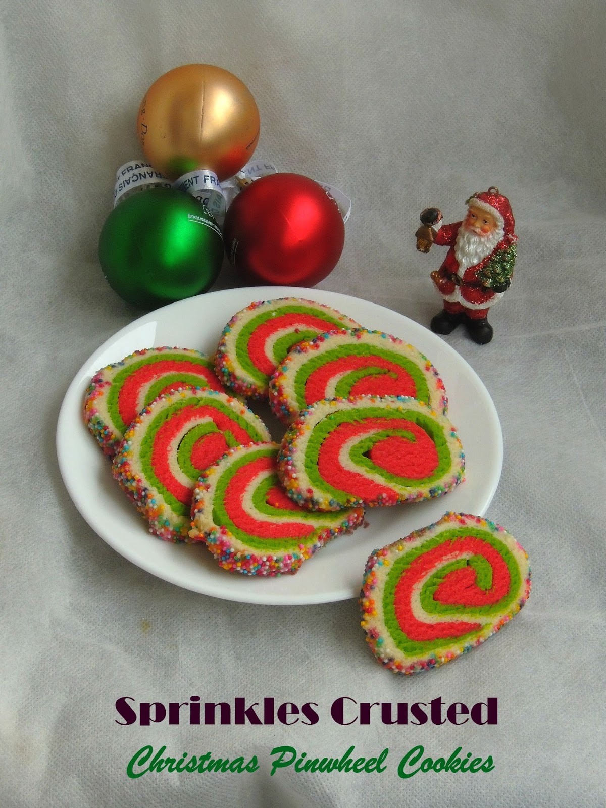 Priya's Versatile Recipes Sprinkles Crusted Eggless Christmas Pinwheel Cookies