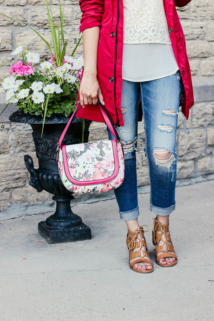 Red Raincoat, white lace top, distressed jeans, floral bag, tan gladiator heels