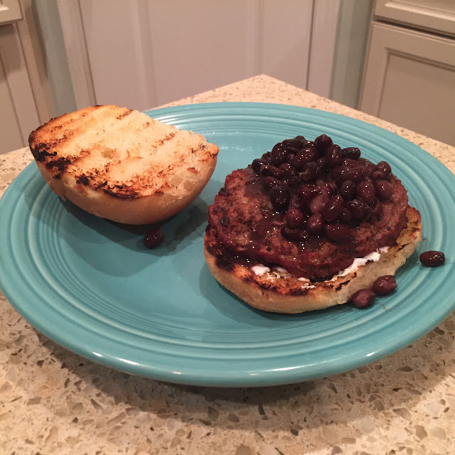 Mexican Taco Burgers topped with black beans, cheese, sour cream & guacamole.  Grill them on Big Green Egg (or grill of choice) Delicious! | The Lowcountry Lady