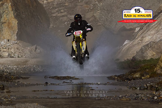 Varun Chaudhary has been sharing some of the great Motorsport Photo Journeys with us for last few years and this time it's about recent chapter of Raid de Himalaya 2013. It was 15th Raid-de-Himalaya event by Himalayan Motorsports which started from Shimla and goes towards Leh through one of the most difficult terrains in Himalayas. Let's check out this Photo Journey and know about the action during these couple of days on roads...So this time Raid-de-Himalaya happened from 4th October to 12th October.  On 4th & 5th  October 2013, administrative and Technical Scrutiny happened ensure safety norms are adhered to as per the FiA, FIM and Federation regulations. All this happened in Shimla and other hills around it. A Ceremonial Start happened in the afternoon of the 5th October 2013, along with drivers briefing and the press meet. Raj Singh Rathore had come with polaris and many of the contestants had eyes on Raj for a winning position this time, but unfortunately he had to quit because of technical failure on the way.On 6th October  2013, riders started from Shima and day's halt was Manali. On first day there was 3 stages to Manali. Short, fast, yet testing enough .. And day1 is most challenging for folks participating first time. And many of the folks get out of the race on day 1 itself. There can be multiple reason for getting out of the race.. Technical breakdown is one of them..Second day started with ride from Manali | 7th October  2013 Halt for the day was Kaza. It was a beautiful run over the first pass of the Pir Panjal range - Rohtang. Day 2 had one of the iconic stage from Gramphoo to Losar . This time it was rougher than ever. Just this one stage for the day saw the rally get into Kaza... And then it was time to repair and get ready to continue the next journey.On 8th October  2013, the journey started from Kaza and plan was to come back to Kaza via Dhankar... It was day of exploring The Monastery Necklace with dirty motors roaring around the hills.. It was a day filled with climbs and descents with awesome landscapes as the route winds by one monastery, then another and yet another... Stages of third day were tight, weather was unpredictable and tough competition of-course :)On 9th October  2013, again all riders and the convoy started from Kaza to ride through Gramphoo, Patseo and Sarchu to hit Pang. The 4th day of the rally promised to be a long one. Terrible stage back to Gramphoo and then the superfast one from Patseo to Sarchu promised high altitude action beyond compare! At Pang, the team stayed at Army barak. Pang was relatively in pain regions but was chilled out there.On 10th October  2013, all of us started from Pang towards Leh through Debring... The day was extremely fast paced. Two stages that were both fast and tricky tested the nerves & skill .. The Himalayas watched overOn 11th October 2013, it was again a tour back to Leh via Wari La... Comparatively a short day. Definitely not an easy one though. A single stage - all tarmac - but extremely technical. Most were  trying to hold it all together till the finish line... During the final stage Sanjay Aggarwal made best use of his skills and Grand Vitara to take second place. The last day - 12th October 2013- It was Prize Distribution Ceremony  which concluded by 1300 hrs, followed by lunch.During the Raid-de-Himalayan event, security is one of the main concern and team ensures that everyone is hit along with their motors & backup plan. Apart from that rescue teams are appointed at different posts on the way and there was a chopper for emergency cases. Fortunately we didn't need it during the event and everyone was happy about the fact.Helly holds the overall first position of Raid-de-Himalaya 2013 ! A very fast dude from Austria. And it was his birthday on prize distribution day.Here is a nice account on the ride of first day - ttp://www.motoroids.com/news/maruti-suzuki-raid-de-himalaya-2013-day-1-results/Raid-de-Himalaya is one of the most popular Motorsports events in India and riders starts waiting for next event from the day the previous one ends !!!