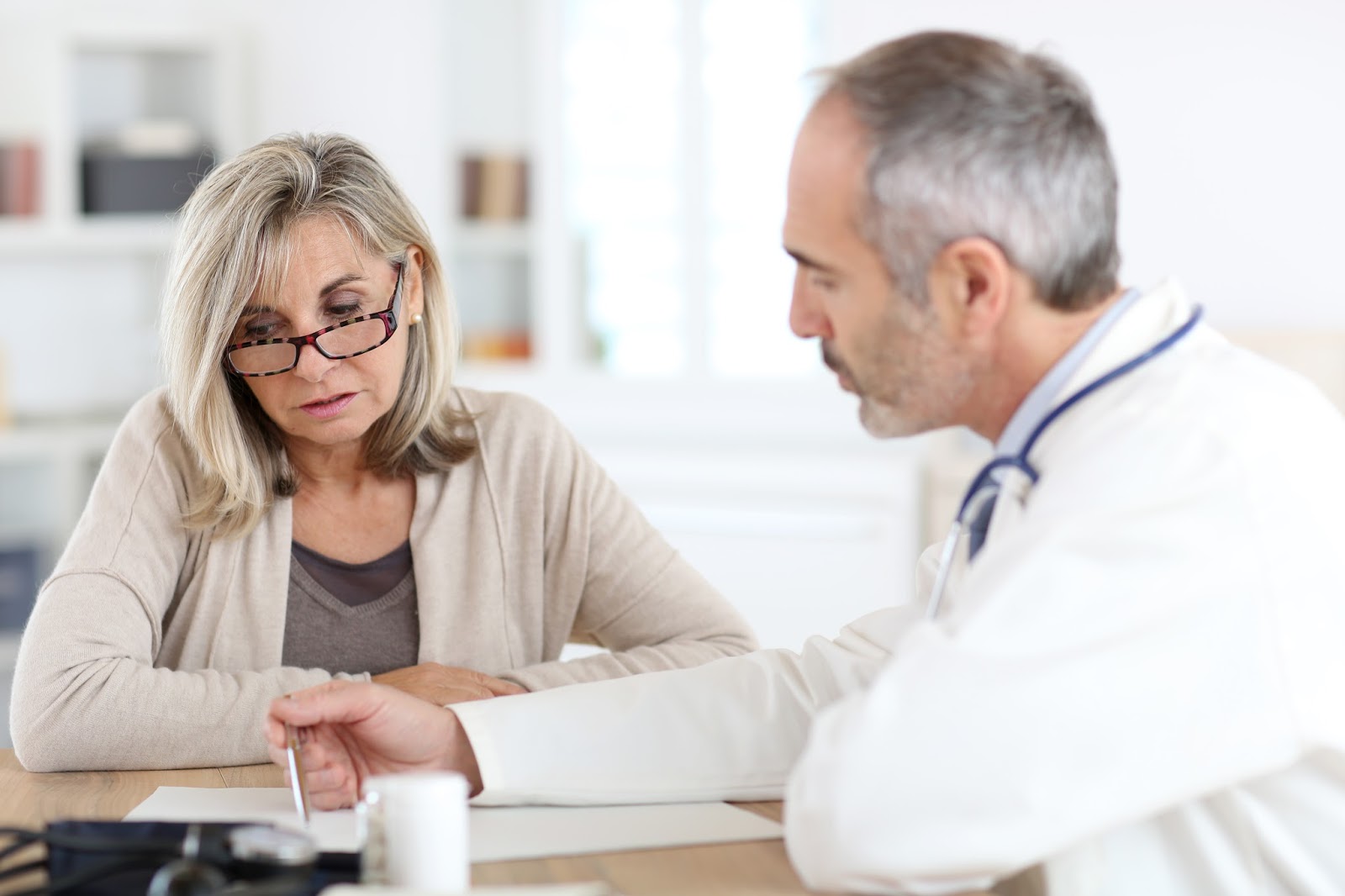 Women and doctor in conversation