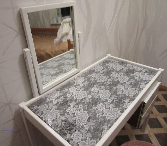 Lace covered dresser table top