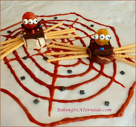 Snack Cake Spiders, a fun no bake project for Halloween. Spiders made from snack cakes and candies | Recipe developed by www.BakingInATornado.com | #recipe #Halloween