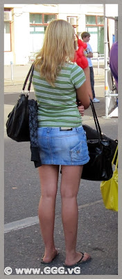 Girl in denim skirt on the street