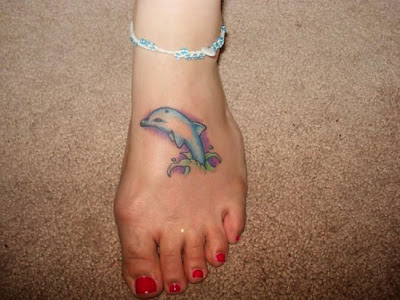 Dolphin Tattoos Designs For Girls,dolphin tattoos designs,tattoos designs for girls,tattoo designs girls,dolphin tattoo designs,dolphin tattoo ideas,free tattoos designs for girls,dolphin tattoos for girls,dolphins tattoos for girls