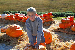 Kelby picking out his Pumpkin