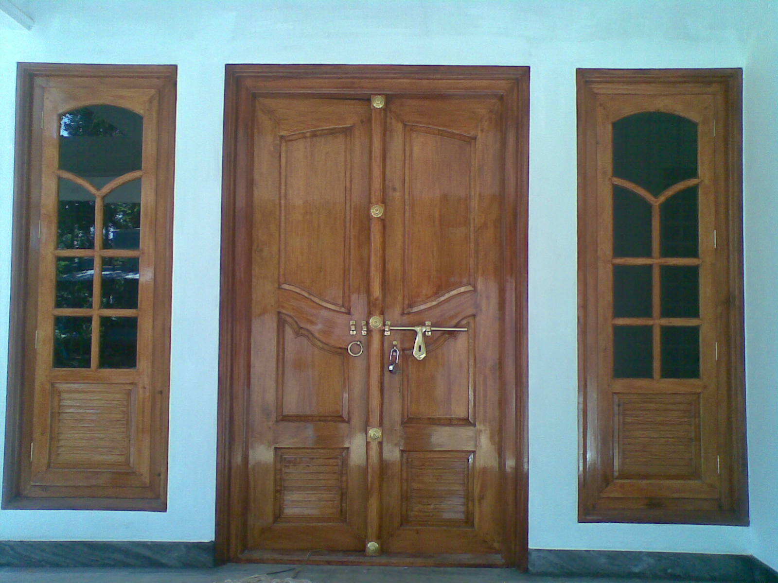 Bavas Wood Works Kerala Style Wooden Front Door Double Door Designs