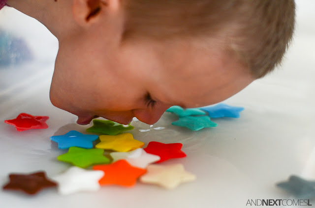 Bobbing for stars sensory bin - a fun oral motor sensory activity for kids from And Next Comes L