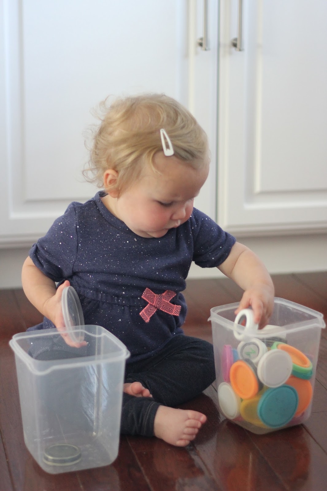 Toddler Approved! Drop and Dump Toddler Lid Activity