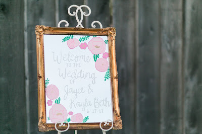 Rustic barn wedding meets vintage fairy tale. Meadow Creek Farm North Alabama Wedding Venue. Vintage Beauty and the Beast inspired wedding reception decoration ideas. Hand painted vintage mirror at wedding ceremony entry