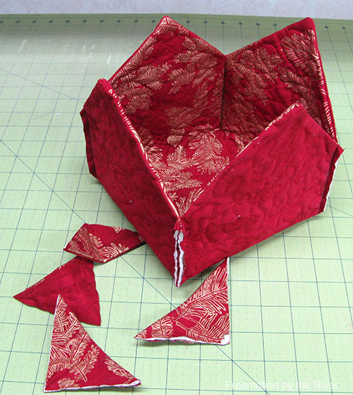 Trim off corners of fabric basket Trim off corners of fabric basket