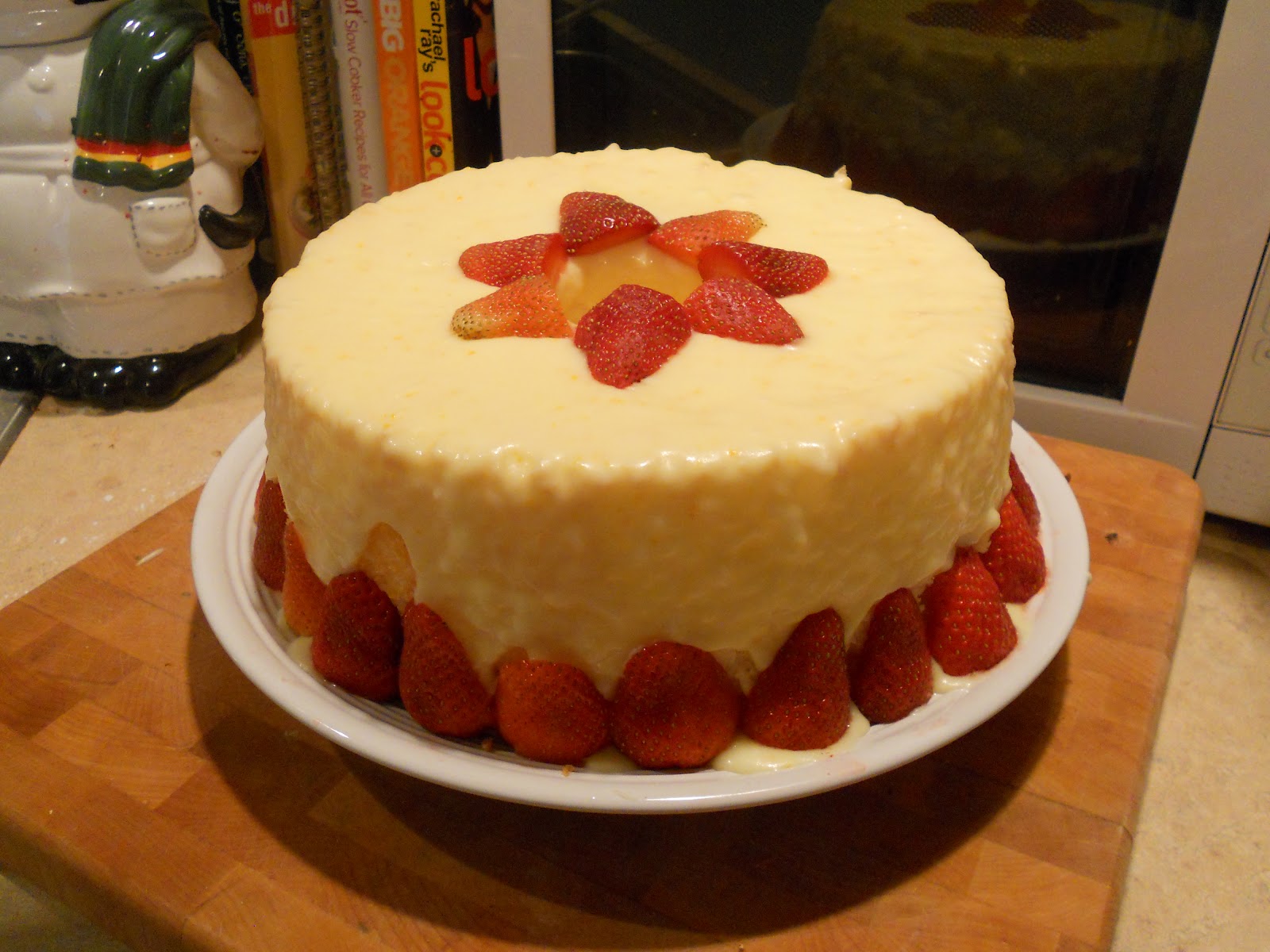 Sweet Emily Angel Food Cake With An Orange Glaze with Fresh Strawberries